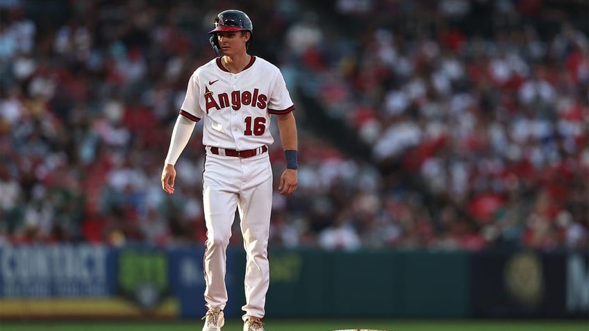 angels outfield blunder nearly costs team game in extra innings victory over tigers