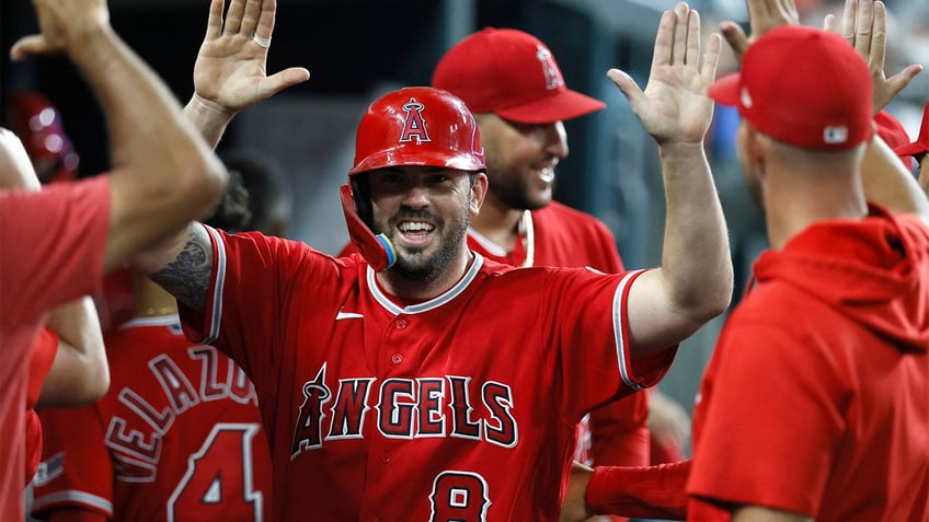 angels outfield blunder nearly costs team game in extra innings victory over tigers