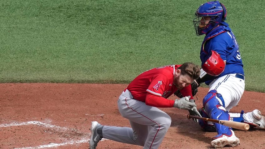 angels taylor ward struck in head by pitch from blue jays alek manoah taken to hospital terrible moment