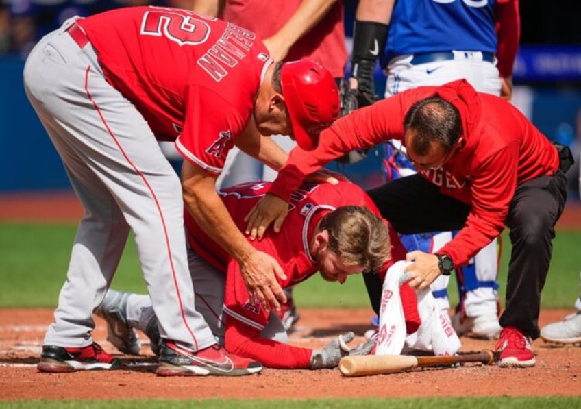 angels ward hit in face by pitch in game at toronto