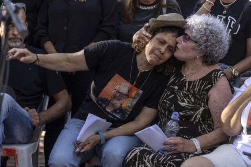 Ruti and Keren Munder mourn husband and father Avraham Munder who was taken hostage by Pal