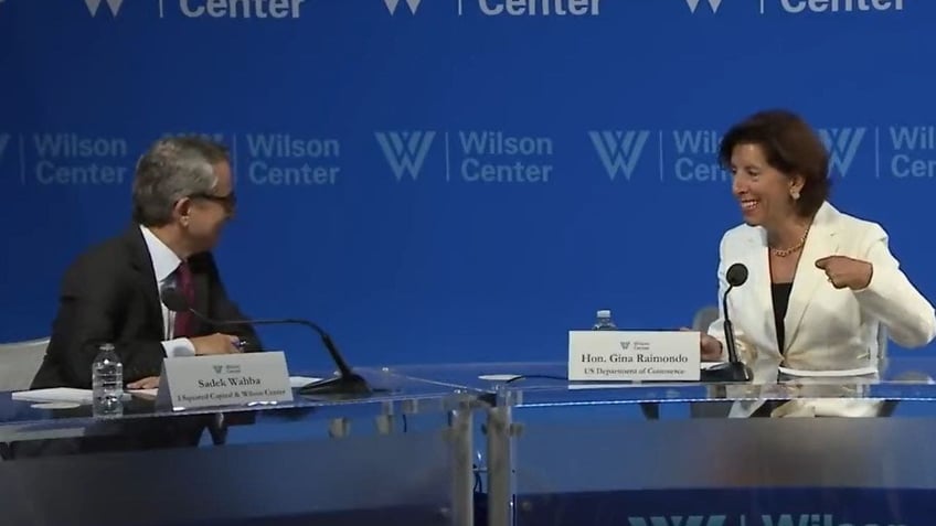 angry climate change protestors force commerce secretary gina raimondo to flee talk at the wilson center