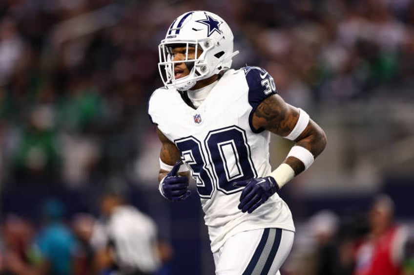 Juanyeh Thomas of the Dallas Cowboys runs downfield during an NFL football game against the Philadelphia Eagles at AT&T Stadium on December 10, 2023...