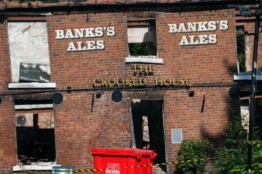 angry villagers in england call for the quirky crooked house pub to be rebuilt following demolition