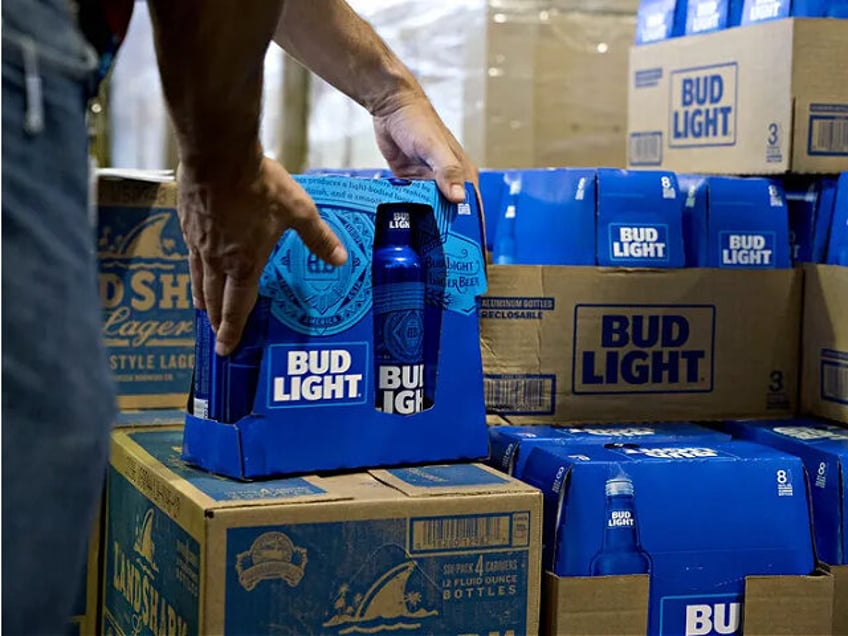 anheuser busch lays off hundreds of workers amid bud light boycott