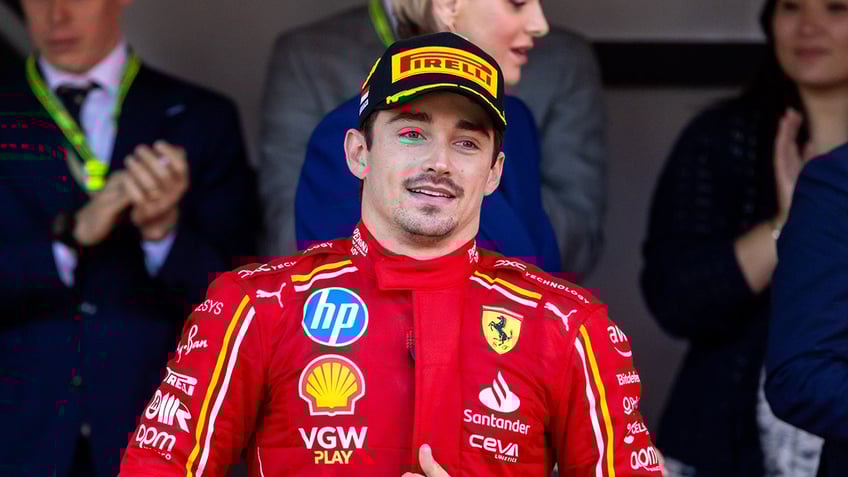 Charles LeClerc walks on track