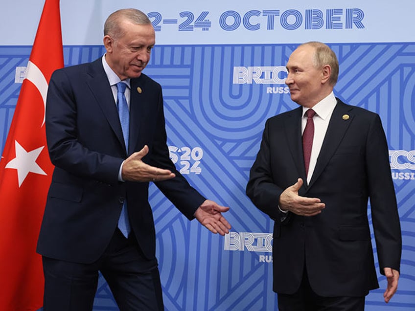 Russian President Vladimir Putin, right, meets with Turkish President Recep Tayyip Erdogan