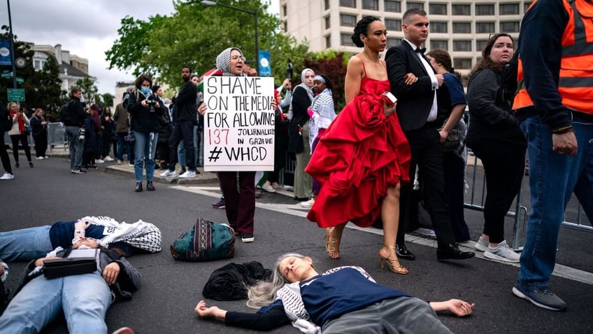 Protesters playing dead in street