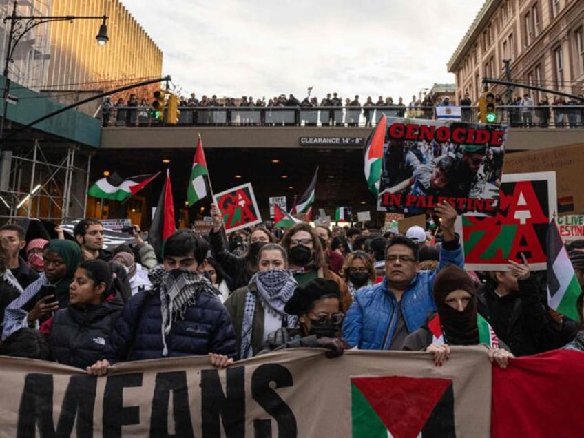 Students and activists protesting Columbia University's decision to suspend the student groups Students for Justice in Palestine and Jewish Voice for Peace for holding pro-Palestine events on campus outside of Columbia University in Manhattan, New York, on Nov. 15, 2023. (Shawn Inglima/New York Daily News/Tribune News Service via Getty Images)