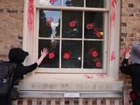 Anti-Israel demonstrators gather at UNC-Chapel Hill Chancellor's office, smear red paint on building