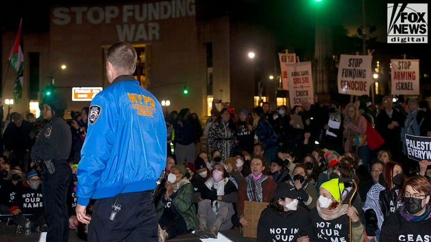 NYPD in front of large crowd of protesters