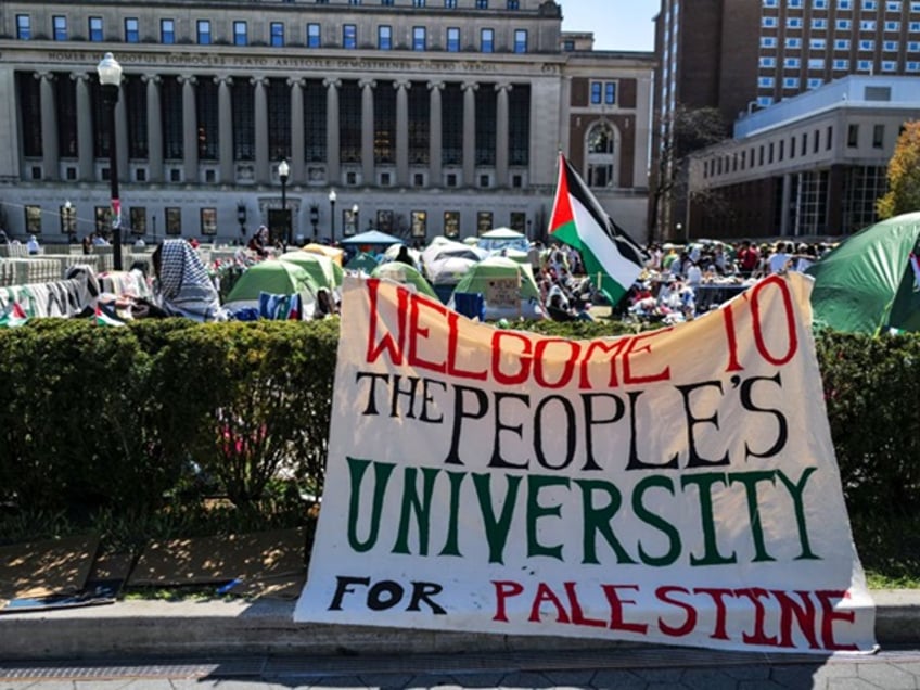 People rally on the campus of Columbia University which is occupied by pro-Palestian protesters in New York on April 22, 2024. US President Joe Biden condemned any anti-Semitism on college campuses on April 21, 2024 as pro-Palestinian protesters at Columbia University spent their fifth day demanding the school sever financial ties with key US ally Israel. (Photo by Charly TRIBALLEAU / AFP) (Photo by CHARLY TRIBALLEAU/AFP via Getty Images)