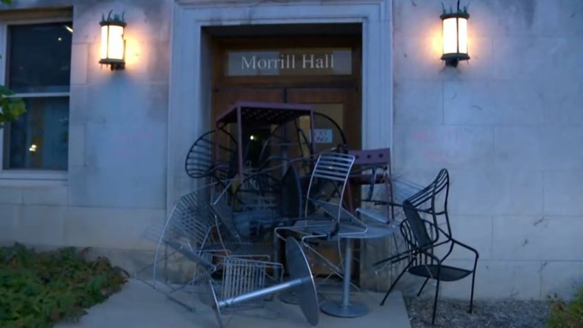 Morrill Hall door barricaded with chairs and tables