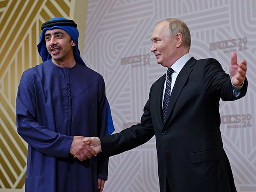 Russian President Vladimir Putin, right, and United Arab Emirates Foreign Minister Abdulla