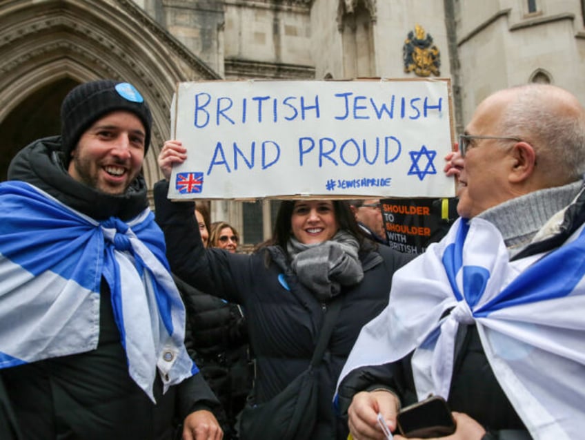 LONDON, UNITED KINGDOM - 2023/11/26: A protester holds a placard during the demonstration.