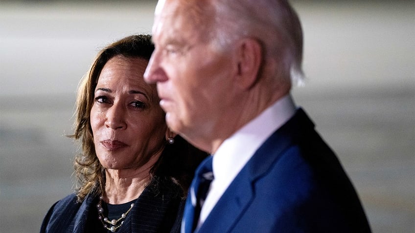 Kamala Harris looking at Joe Biden, closeup shot 