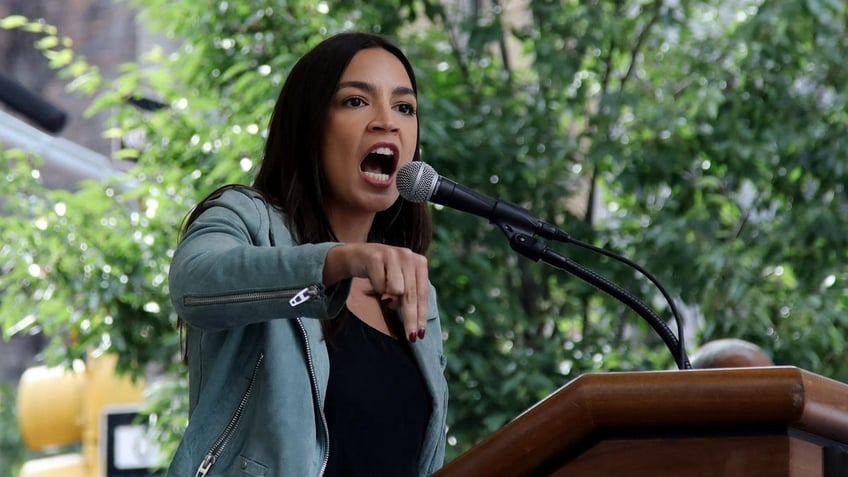 aoc contradicts biden says economy in crisis during union workers speech