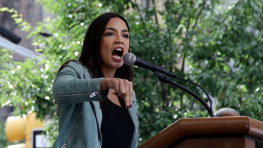 aoc demands biden reverse course on border wall construction amid migrant surge cruel policy