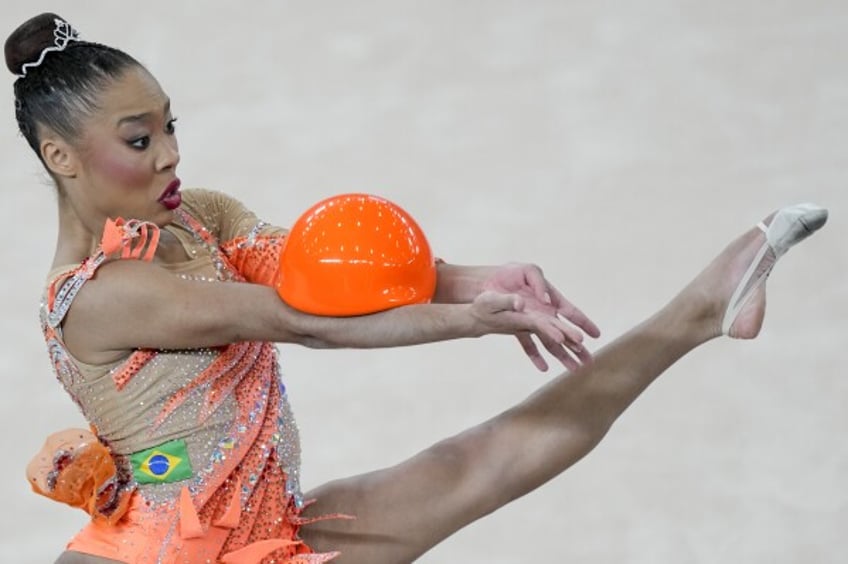 Brazil's Geovanna Santos competes in the gymnastics rhythmic individual ball final at the Pan American Games in Santiago, Chile, Friday, Nov. 3, 2023. (AP Photo/Esteban Felix)