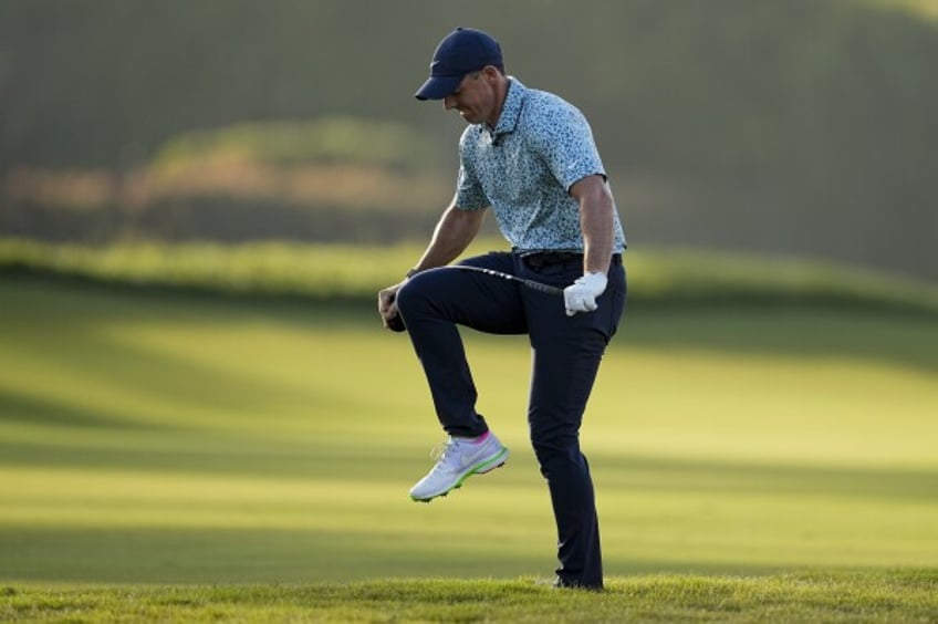 Rory McIlroy reacts after his shot from the rough on the 14th hole during the third round of the U.S. Open golf tournament at Los Angeles Country Club on Saturday, June 17, 2023, in Los Angeles. (AP Photo/George Walker IV)