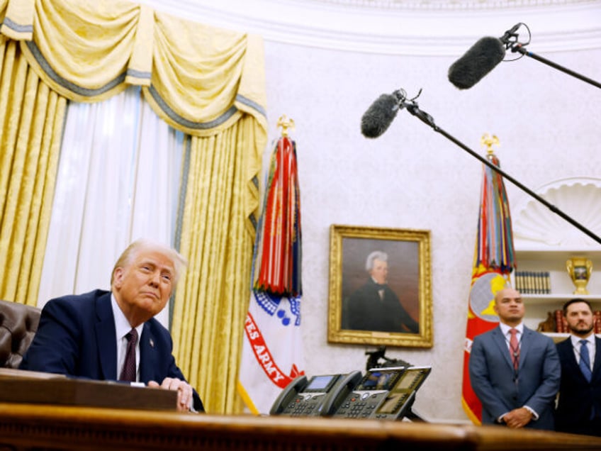 U.S. President Donald Trump speaks to reporters after signing a series of executive orders