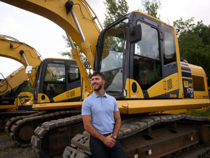 ATLASBURG, PENNSYLVANIA-AUGUST 6: Emmanuel Paris, 31, is a 4th-generation contractor, outs