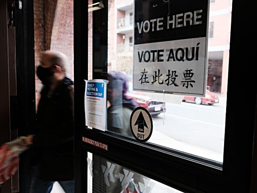 NEW YORK, NEW YORK - NOVEMBER 02: People visit a voting site at a YMCA on Election Day, No