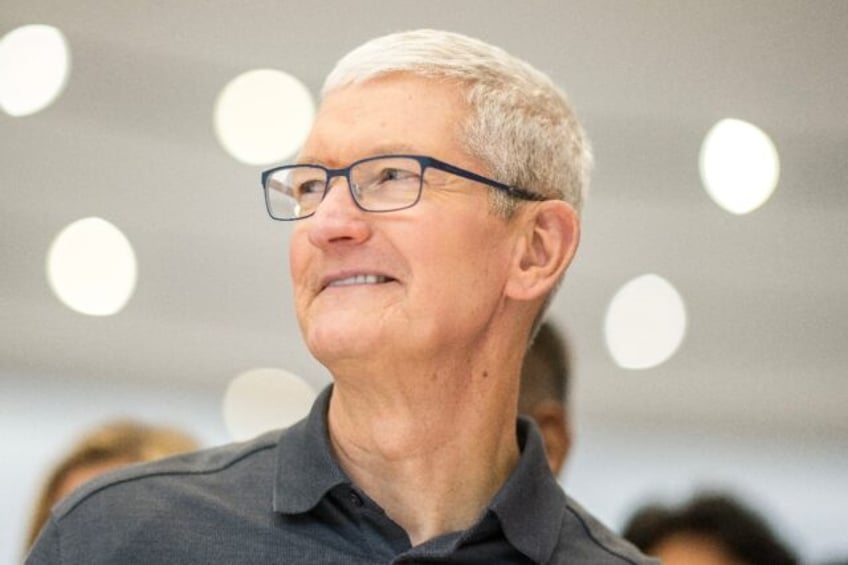 apple ceo tim cook makes surprise visit to china