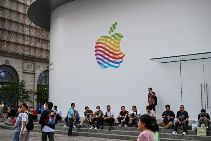 apple shares fall on reports of china iphone restrictions