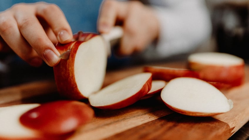 slicing an apple