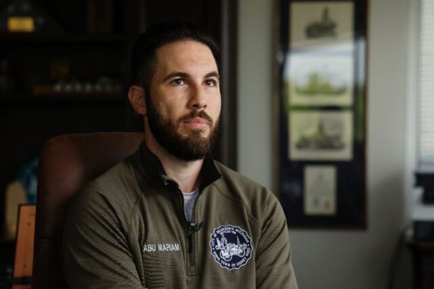 Dearborn Mayor Abdullah Hammoud poses for a portrait in his office in Dearborn, Michigan o