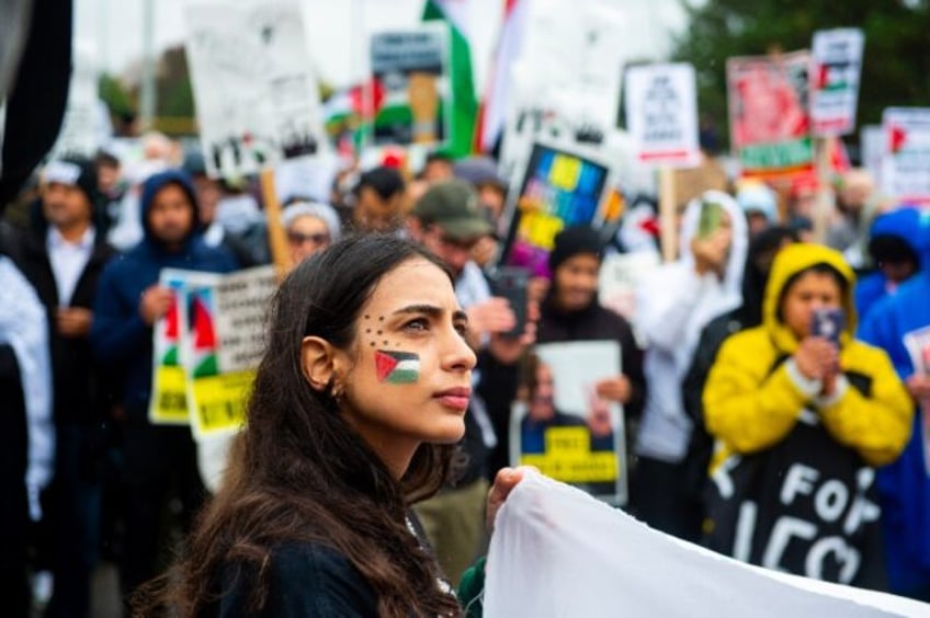 Residents of Detroit and the Arab community of Dearborn march in support of Palestinians on October 14, 2023 in Dearborn, Michigan, a state where US President Joe Biden faces a tough reelection battle