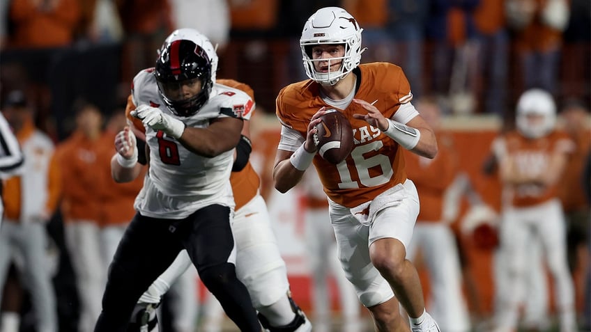 arch manning makes highly anticipated texas debut against red raiders crowd was buzzing