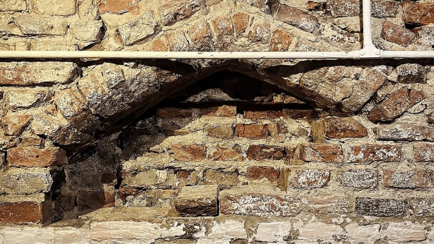 The top of an archway found in St. George's Guildhall 