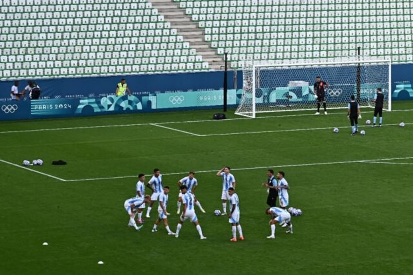 The Argentina players came back out to warm up in an empty stadium before their match agai