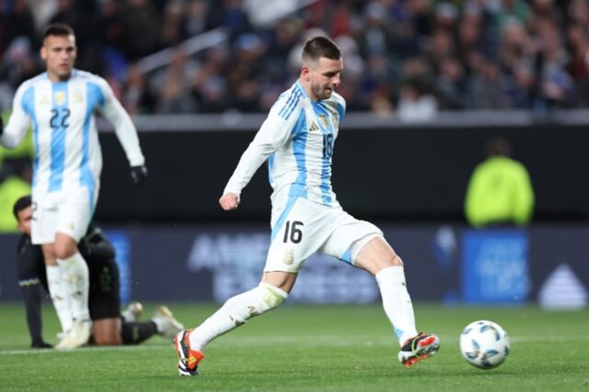 Argentina midfielder Giovani Lo Celso scores a goal in a 3-0 victory over El Salvador in a