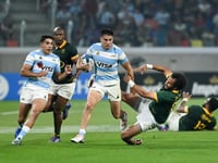 Argentina edge South Africa to keep title hopes alive