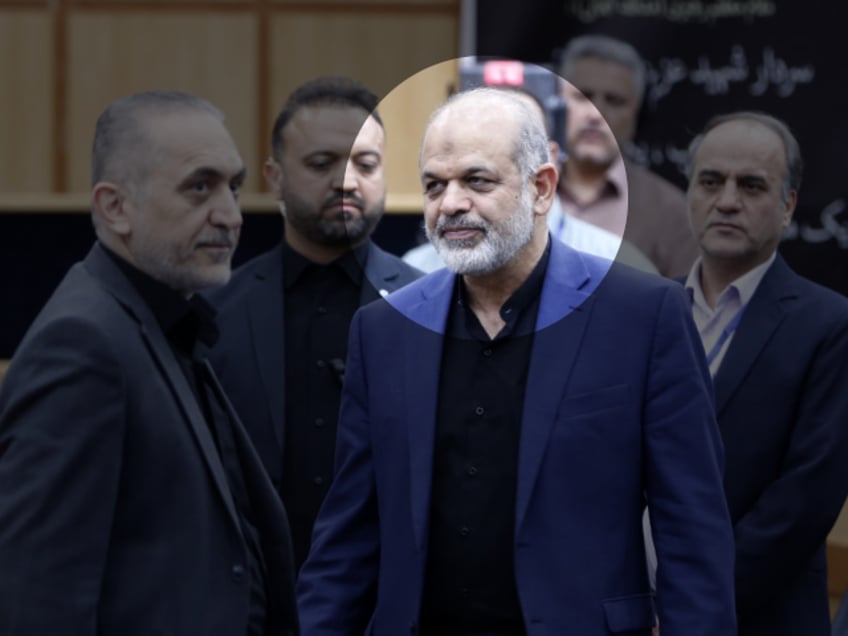 TEHRAN, IRAN - MAY 30: Iranian Interior Minister Ahmad Vahidi (2nd R) arrives to speak on