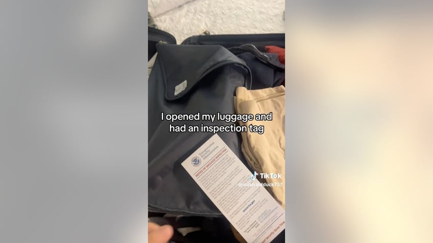 Arizona woman's luggage inspection tag