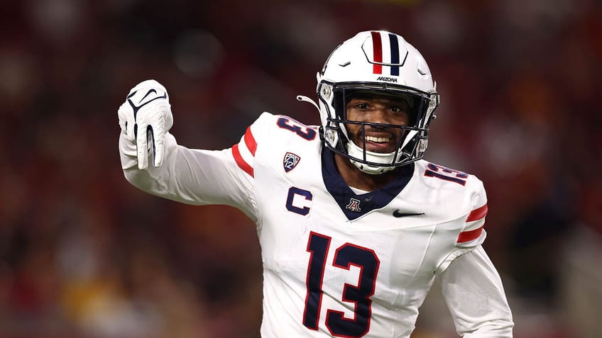 Martell Irby smiles during a football game