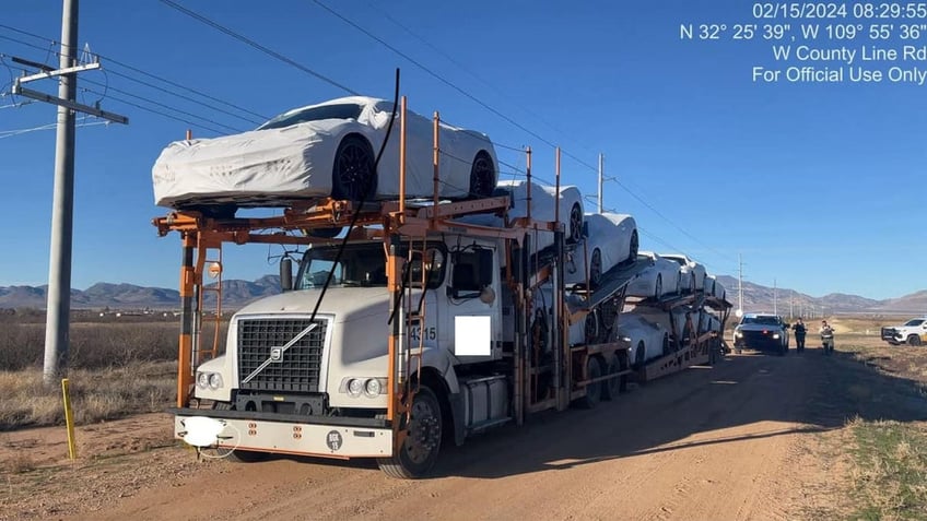 semi-truck with new Corvettes