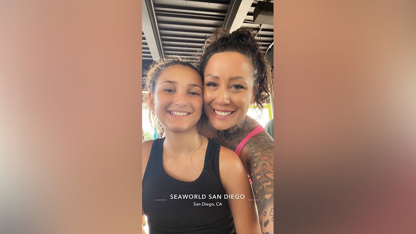 Salina Higgins smiles with her daughter