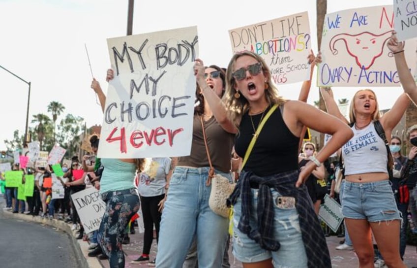The Arizona supreme court said Tuesday an 1864 law banning abortions can be enforced