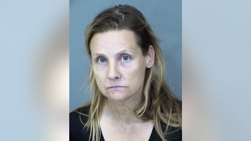 arizona woman arrested for keeping dozens of dogs in squalor others dead in freezer