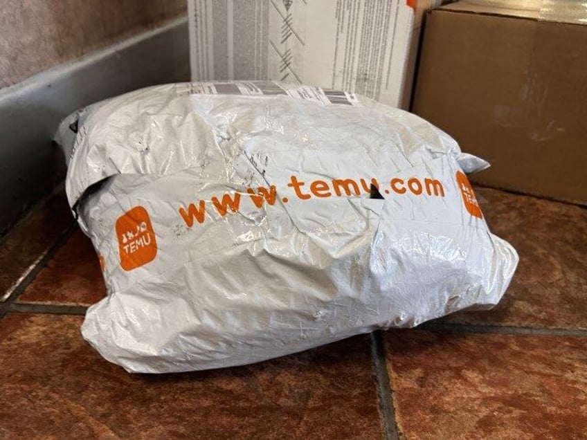 Temu package in apartment building lobby, Temu, which is owned by Chinese parent company P