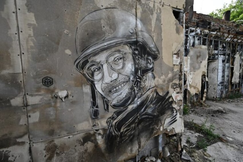 A mural of AFP journalist Arman Soldin, who was killed near Bakhmut last year, by artist C