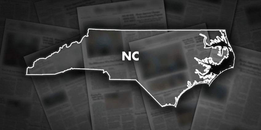 armed man in north carolina shot and killed by officers during pursuit