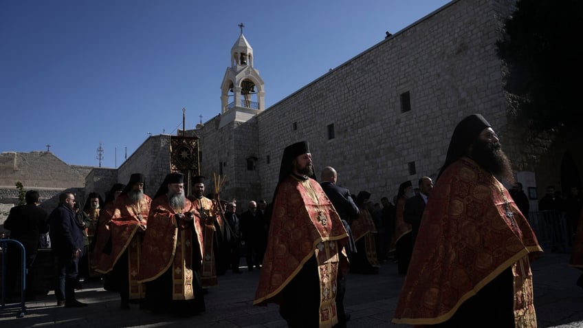 armed palestinians attack christian holy site in west bank report