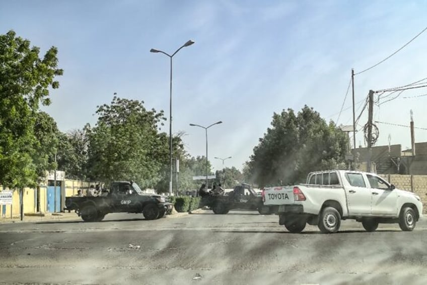 Chadian soldiers block the road leading to the headquarters of the opposition Socialist Pa