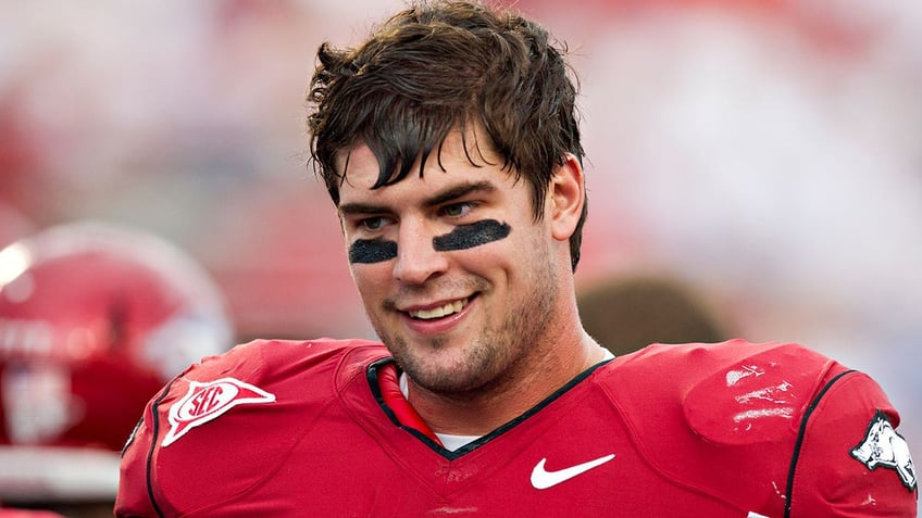 Jake Bequette of the Arkansas Razorbacks warming up before a game against the New Mexico Lobos at War Memorial Stadium on Sept. 10, 2011, in Little Rock, Ark.